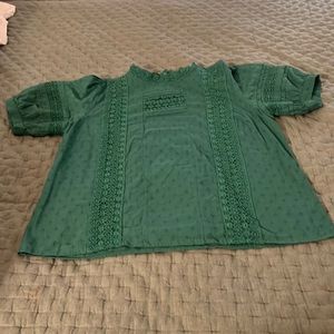 Green universal thread blouse size large on good condition.